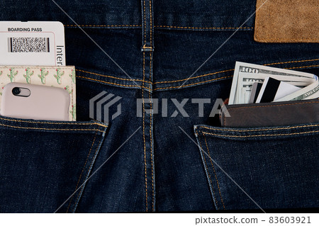 Money, Smart, Debit card and Credit card are in pocket of blue jean. Money, Smart, Debit card and Credit card are in pocket of blue jean. 83603921