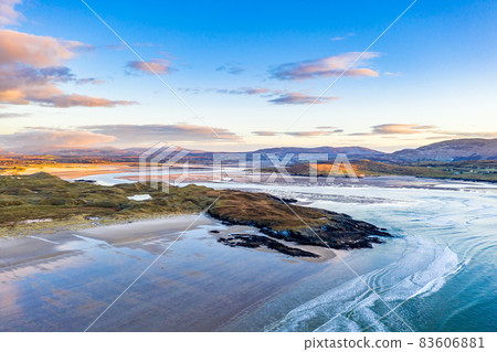 The coast between Kiltoorish bay beach and the Sheskinmore bay between Ardara and Portnoo in Donegal - Ireland 83606881