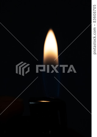 Bright fire lighters in the dark closeup Bright fire lighters in the dark closeup 83608705