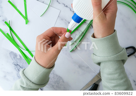 Gift idea, decor Spring, happy Patrick Day. Step by step. Diy St. Patricks Day greeting card made of Quilling and paper clovers on white background. 83609922