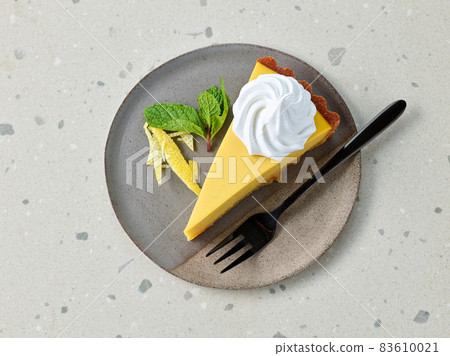 slice of lemon tart slice of lemon tart 83610021