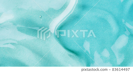 Transparent hyaluronic acid gel on a blue background. 83614497