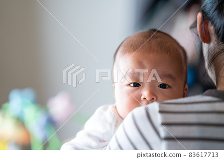 Baby hugged in Mama 83617713