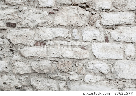 Old stonewall and new red bricks. Art stone texture. The backdrop surface has a natural color. Limestone background for branding, calendar, multicolor card, banner, cover, header for website. High Old stonewall and new red bricks. Art stone texture. The backdrop surface has a natural color. Limestone background for branding, calendar, multicolor card, banner, cover, header for website. High 83621577