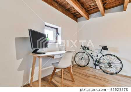 A cozy and spacious office room in a luxury design A cozy and spacious office room in a luxury design 83625378