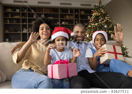 Happy african american family holding video call. Happy african american family holding video call. 83627511