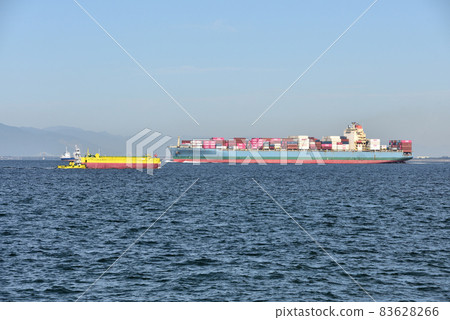 Container ships and ferries sailing in Ise Bay 83628266
