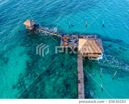 Wooden beach bar in sea and hut on pier in koh Mak island, Trat, Thailand 83630283