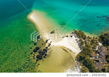 Beautiful tropical island koh Kham, white sand beach with volcanic rocks, near koh Mak, Trat 83630302