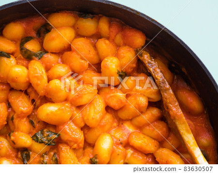 Italian potato gnocchi pasta with tomato sauce and mozzarella cheese 83630507