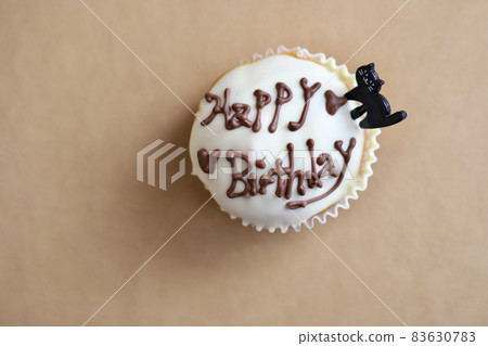 Homemade birthday muffins with chocolate letters 83630783