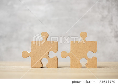 connecting couple puzzle piece, wood jigsaw on table. Business solutions, mission, success, goals and strategy concepts 83631570