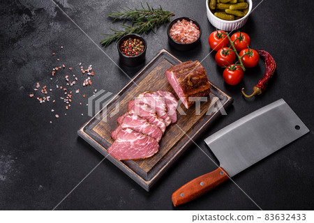 Delicious fresh bacon sliced with bread and vegetables 83632433