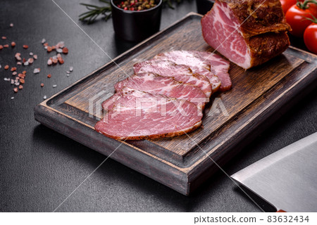 Delicious fresh bacon sliced with bread and vegetables 83632434