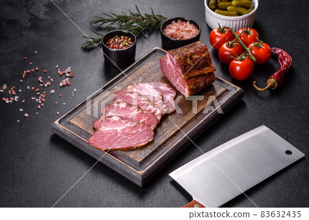 Delicious fresh bacon sliced with bread and vegetables 83632435