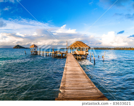 Wooden beach bar in sea and hut on pier in koh Mak island, Trat, Thailand 83633021