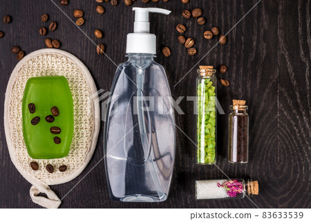 soaps, bath salt, mask on wood table background. spa soaps, bath salt, mask on wood table background. spa 83633539