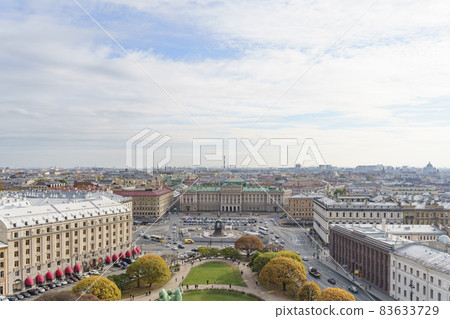 Panorama of St. Petersburg from the background height. View of the rooftops of St. Petersburg in autumn. Points of interest and city center 83633729