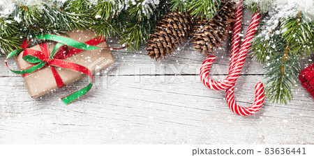 Christmas background with snow fir tree 83636441