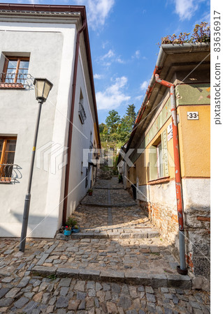 Narrow street in jewish quarter. Trebic, Czech Republic Narrow street in jewish quarter. Trebic, Czech Republic 83636917
