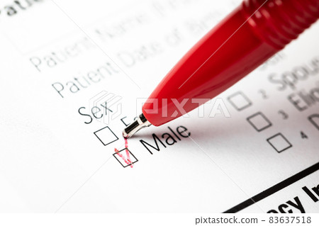 Person marking gender checkbox in a form Person marking gender checkbox in a form 83637518
