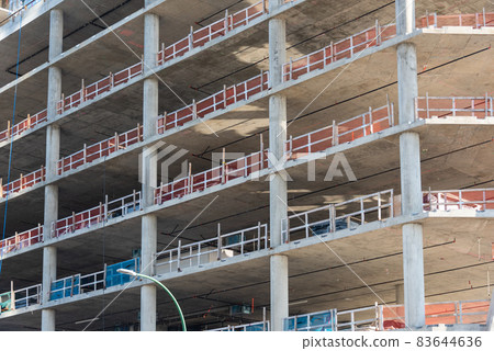 Facade of high-rise concrete building under constraction Facade of high-rise concrete building under constraction 83644636