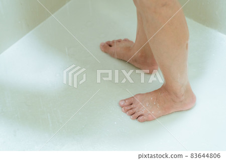Woman enjoy taking a shower and bath. Woman enjoy taking a shower and bath. 83644806