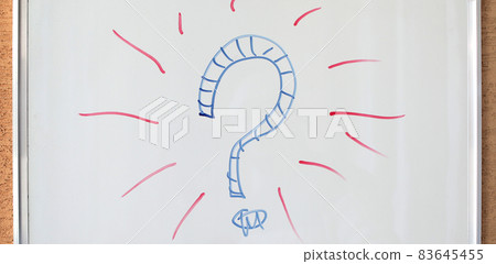 Question mark written in marker on white board Question mark written in marker on white board 83645455