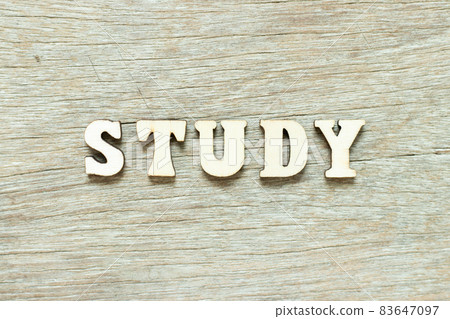 Alphabet letter in word study on wood background Alphabet letter in word study on wood background 83647097
