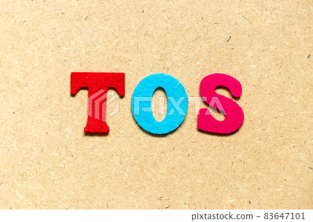 Color cloth alphabet letter in word TOS (abbreviation of Terms of service) on wood background Color cloth alphabet letter in word TOS (abbreviation of Terms of service) on wood background 83647101