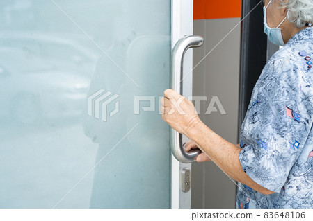 Asian senior or elderly old lady woman patient use toilet bathroom handle security in nursing hospital ward, healthy strong medical concept. 83648106