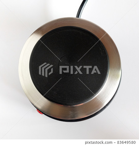 Top vew of Electric stainless steel stove or multi funtional coffee stove. Top vew of Electric stainless steel stove or multi funtional coffee stove. 83649580