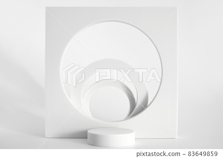 White podium on the white background, simple geometric forms. Podium for product, cosmetic presentation. Creative mock up. Pedestal or platform for beauty products. 83649859