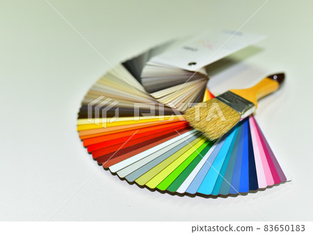 Color palette swatches with paint brush. Palette of different colors and shades on white background. 83650183