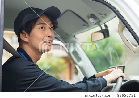 A refreshing driver driving a truck A refreshing driver driving a truck 83656751