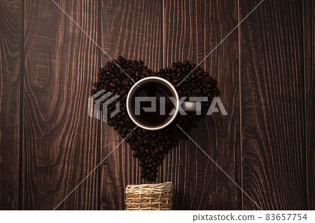 Coffee beans arranged in a heart shape.Love drinking coffee Coffee beans arranged in a heart shape.Love drinking coffee 83657754