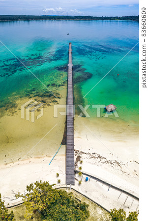 Beautiful tropical island koh Kham, white sand beach with volcanic rocks, near koh Mak, Trat Beautiful tropical island koh Kham, white sand beach with volcanic rocks, near koh Mak, Trat 83660609
