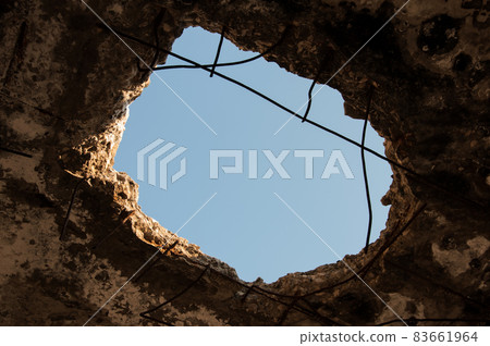 Hole in the ceiling.Consequences of war. 83661964