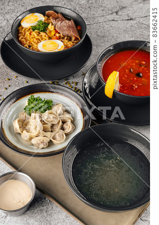 Various first course soup dishes 83662415