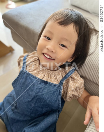 Girl leaning on a sofa 83662734