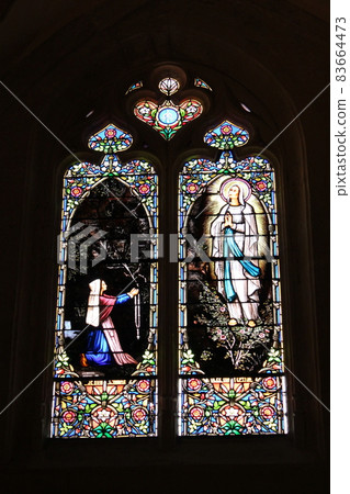 Stained glass of Saint Sasseldo Cathedral in Sarlat, France 83664473