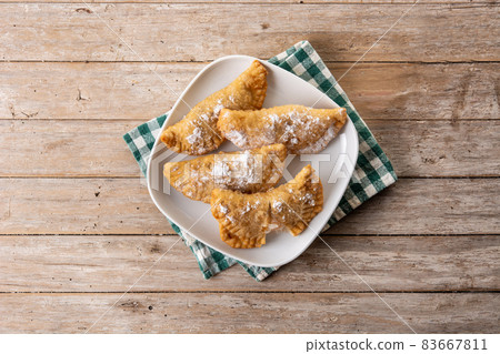 Spanish sweet stuffed pastry filled with angel hair Spanish sweet stuffed pastry filled with angel hair 83667811