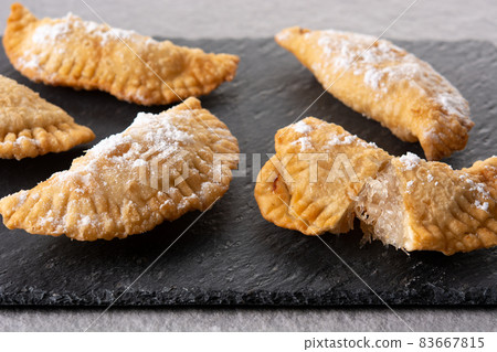 Spanish sweet stuffed pastry filled with angel hair Spanish sweet stuffed pastry filled with angel hair 83667815