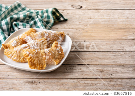 Spanish sweet stuffed pastry filled with angel hair 83667816