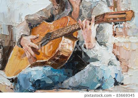 .The girl plays the guitar. 83669345