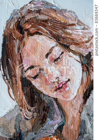 .The girl plays the guitar. 83669347