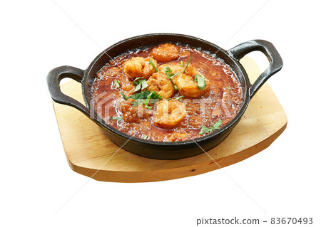 Overhead shot of Scampi baked in little pan. Overhead shot of Scampi baked in little pan. 83670493