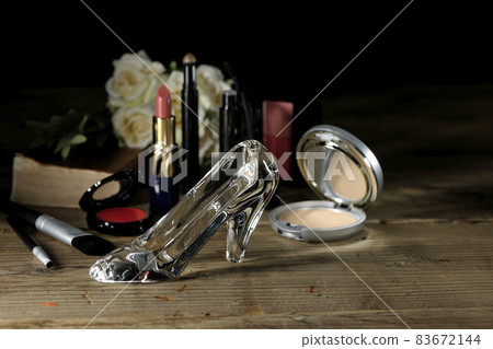 Glass shoes, lipstick, cheeks, mascara, foundation, brushes, bouquets, and the Bible. Marriage image. Cinderella. Glass shoes, lipstick, cheeks, mascara, foundation, brushes, bouquets, and the Bible. Marriage image. Cinderella. 83672144