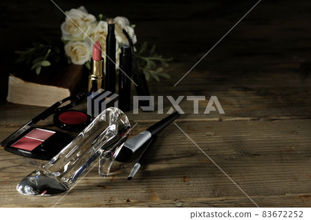 Glass shoes, lipstick, blush, mascara, brushes, bouquets, and the Bible. Marriage image. Cinderella. Glass shoes, lipstick, blush, mascara, brushes, bouquets, and the Bible. Marriage image. Cinderella. 83672252