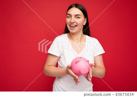 Portrait of happy positive smiling young beautiful attractive brunette woman with sincere emotions 83673834